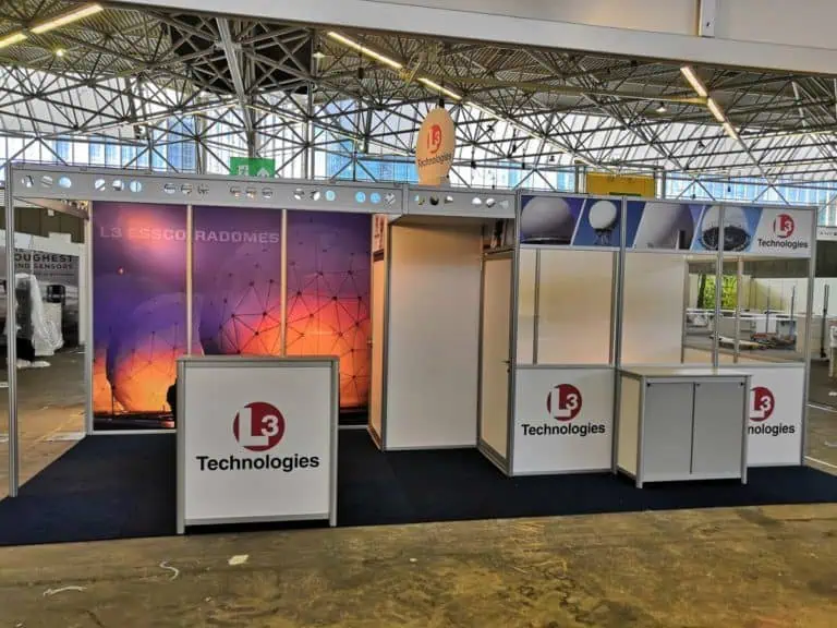 Exhibition stand buildup at RAI Amsterdam, featuring a modern and modern stand design by Adam Expo Stand, with a sleek and modern booth setup, showcasing a company's products and services at a trade show or exhibition.